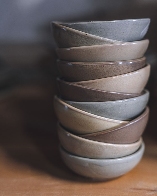 7 Riverstone bowls, 3 in. (8 cm) in diameter, cone-11 porcelain. Photo: Joe DeHart.