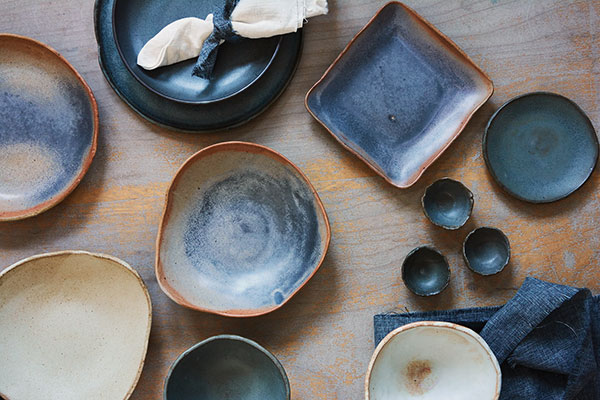 3 Live-Edge stoneware bowls and plates, various dimensions, cone-11 stoneware. Photo: Margarita Garcia.