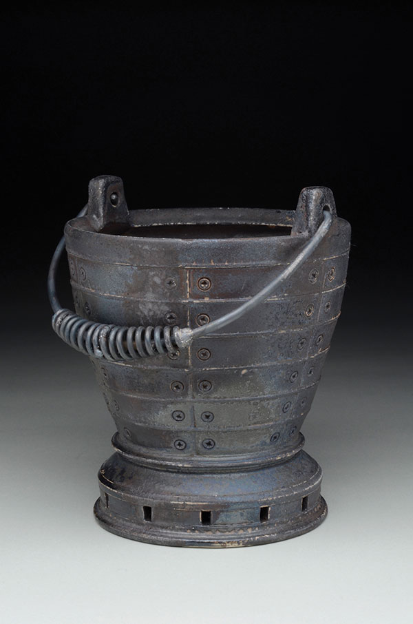3 Ted Neal’s bucket, 9 in. (23 cm) in height, stoneware, iron slips, wood fired to cone 10, reduction cooled, steel, 2019.