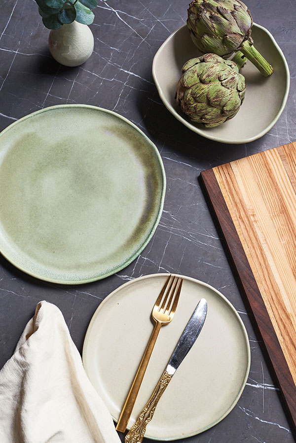 8 Place setting, slab-built and wheel-thrown cone-11 stoneware. Photo: Margarita Garcia. 