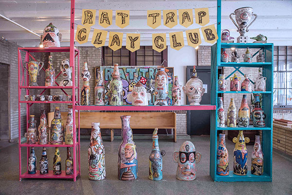 1 Rat Trap Clay Club’s exhibition installation at the 2019 National Council on Education for the Ceramic Arts (NCECA) conference in Minneapolis, Minnesota, variable dimensions, mixed media, 2019. Photo: Angela Yonke