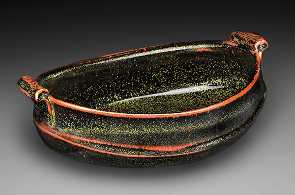 4 Oval bowl, wheel-thrown and altered stoneware, teadust glaze, gas fired to cone 10 in reduction, 2018.