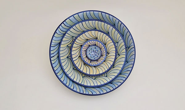 6 Carly Van Anglen and David Ferro’s Internal Waves, 11 in. (28 cm) in diameter, majolica-glazed terra cotta, 2019.