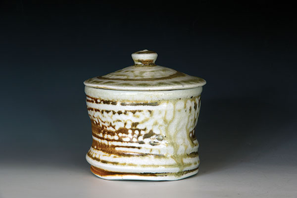 2 Lidded jar with ash run, 5 in. (13 cm) in height, wood-fired and salt-glazed stoneware, slip.