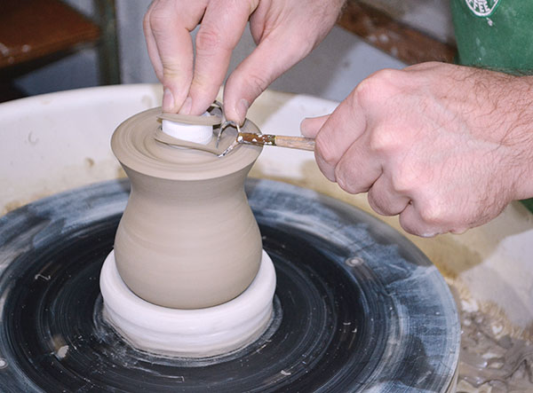 4 I use a bone-dry chuck and a bottle top when trimming the jar.