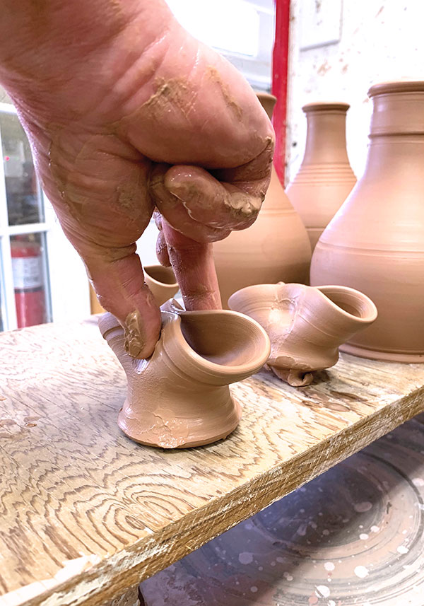 8 Immediately pinch the spout bowl after placing it on a board to dry.
