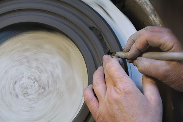 2 Trim the underside of the ring smooth. Then, using a loop tool, carve out two equal grooves.