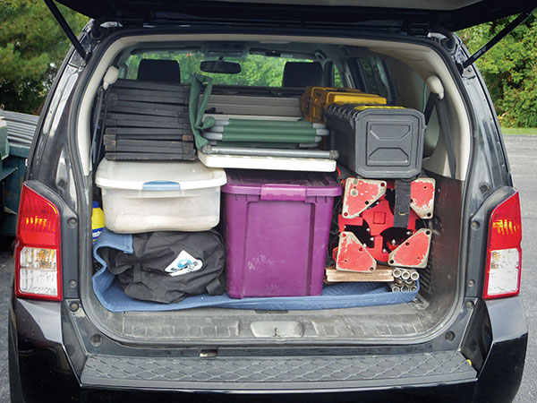 1 Rear view of vehicle loaded up for a show.