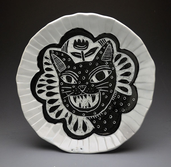 Collaborative plate by Jen Allen and Bryn Perrott, porcelain, black underglaze, fired to cone 10 in reduction. 
