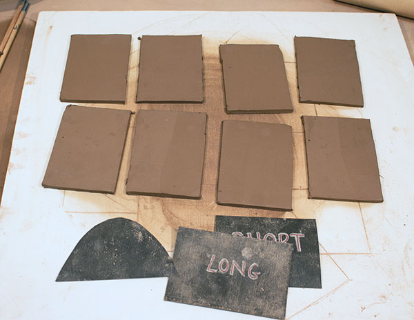 5 Use rectangular tarpaper templates for roof pieces of different sizes.