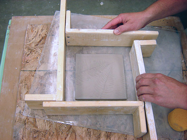 6 Secure cottle boards around the tile, with at least 2 inches around the edges.