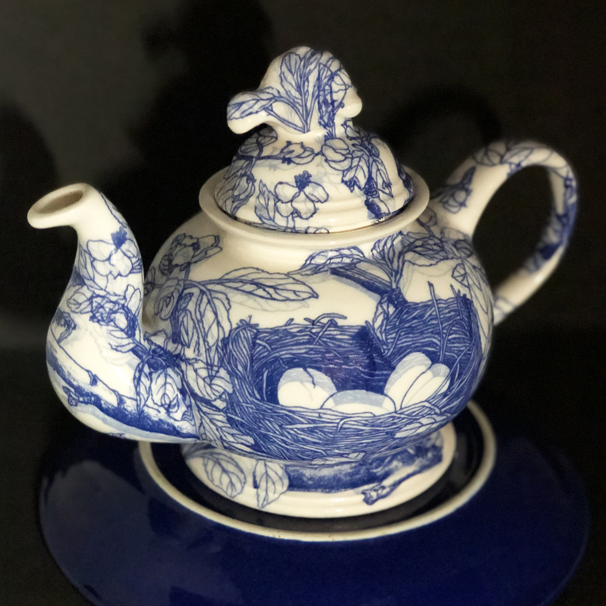 Stephanie Osser, Bluebird Teapot, 7 1/2 in. (19 cm) in height, slip-cast porcelain, clear glaze, fired to cone 5, decal transfers of the artist’s original illustrations from a non-fiction children’s book, second firing to cone 4