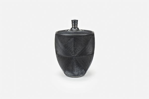 2 Andy Bissonnette’s flat-top jar, 13 in. (33 cm) in height, carved and burnished stoneware, terra sigillata, fired to cone 06, reduced in sawdust, 2019. 