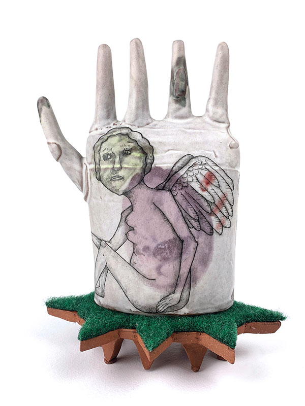 1 Lynne Hobaica’s Maybe now is a good time to leave, 6 in. (15 cm) in height, earthenware, fired to cone 5 in oxidation, china paint, Astroturf, 2019. 