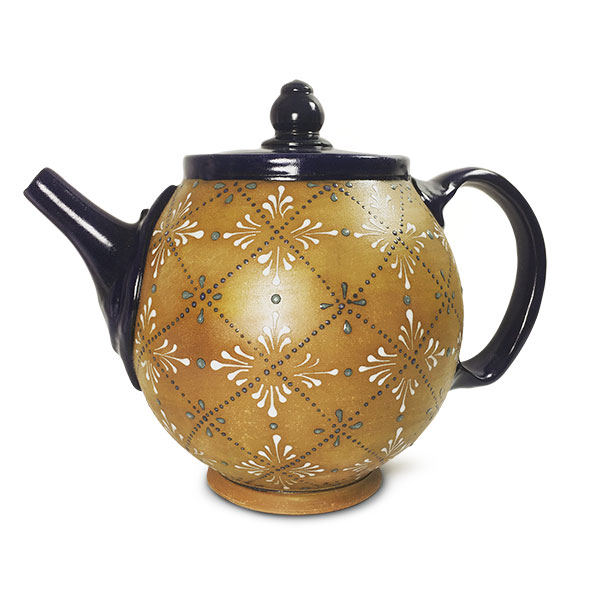 14 Hannah Carver Graeper’s cobalt teapot, 7 in. (18 cm) in height, brown stoneware, fired to cone 6 in an electric kiln, 2019.