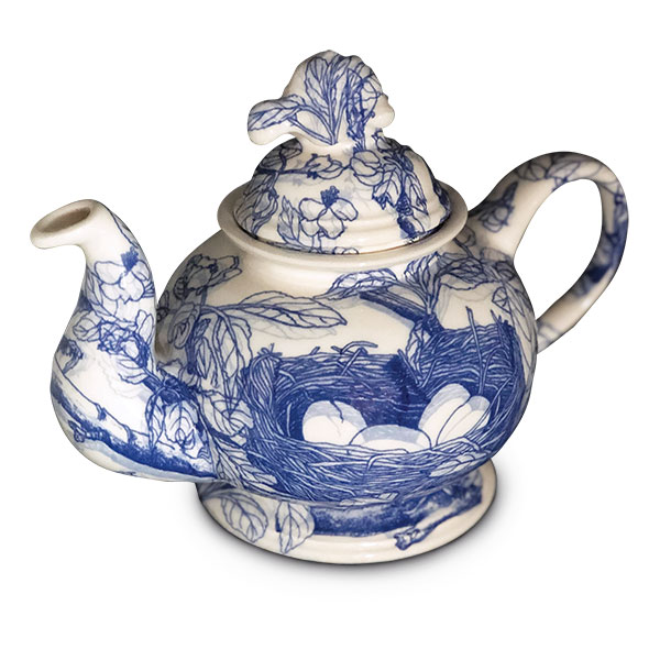  3 Stephanie Osser’s Bluebird Teapot, 7 1/2 in. (19 cm) in height, slip-cast porcelain, clear glaze, fired to cone 5, decal transfers of the artist’s original illustrations from a non-fiction children’s book, second firing to cone 4, 2020. 