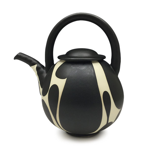 16 Sam Scott’s black and white teapot, 7 1/2 in. (19 cm) in height, Kai porcelain, fired to cone 11, 2019. 