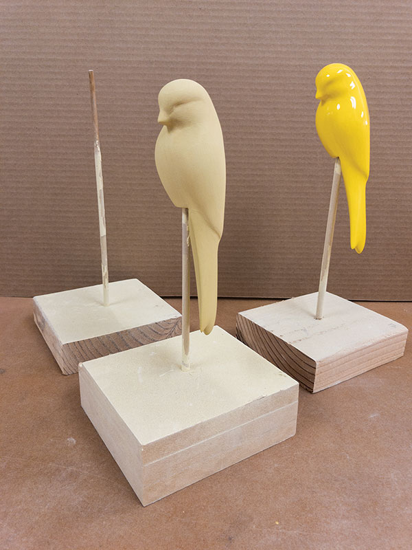 3 Scrap wood and dowel stands were used as supports when applying underglaze and glaze. 