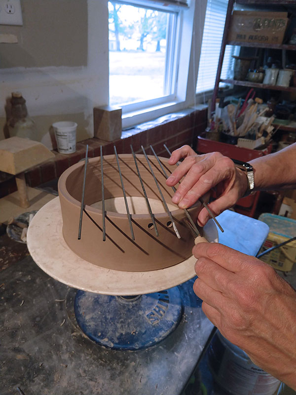 1 Use your bead rods to lay out the hole spacing.