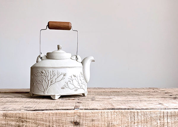 5 New Leaf Teapot, 10½ in. (27 cm) in height, red stoneware, steel wire, hardwood.