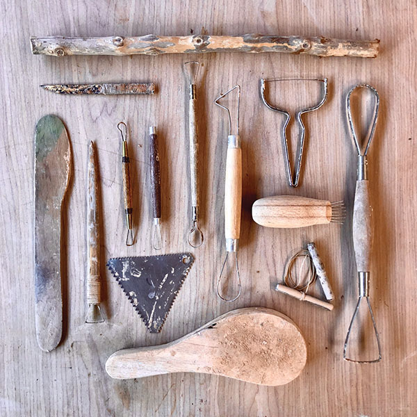 Fig 1 Kurinuki tools include paddles, loop tools, wire tools, and found objects.