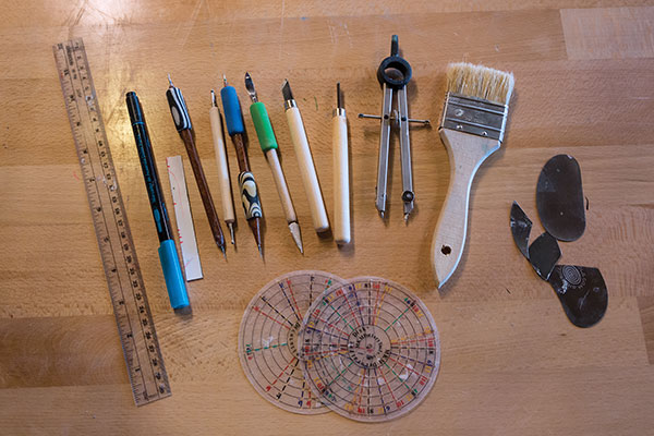 1 Tools for marking and carving include: dividing disks, stylus, wood-carving tools, compasses, stiff paper strips, soft brushes.