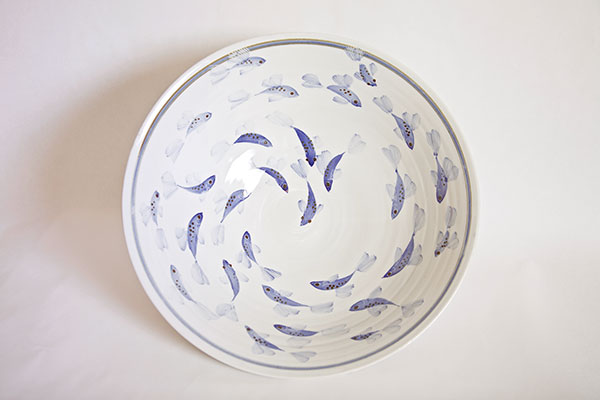 5 Swirling Fish 12 in. (31 cm) in diameter, stoneware, cobalt brushwork, high fired in reduction, 2020. Photo: Clara Florin.