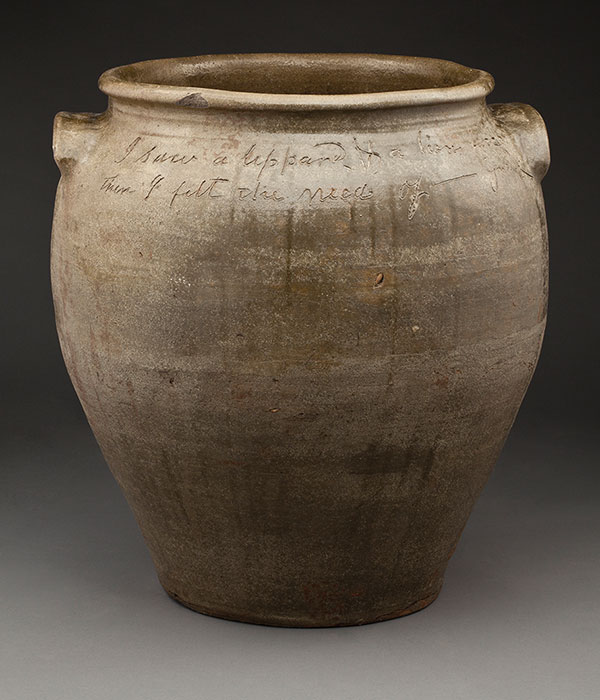 7 David Drake’s jar, 24 1/4 in. (62 cm) in height, alkaline-glazed stoneware, November 3, 1958. The inscription, adapted from the Book of Revelations reads: “I saw a leopard & a lions face/ then I felt the need—of grace.” Collection of Old Salem Museums & Gardens.