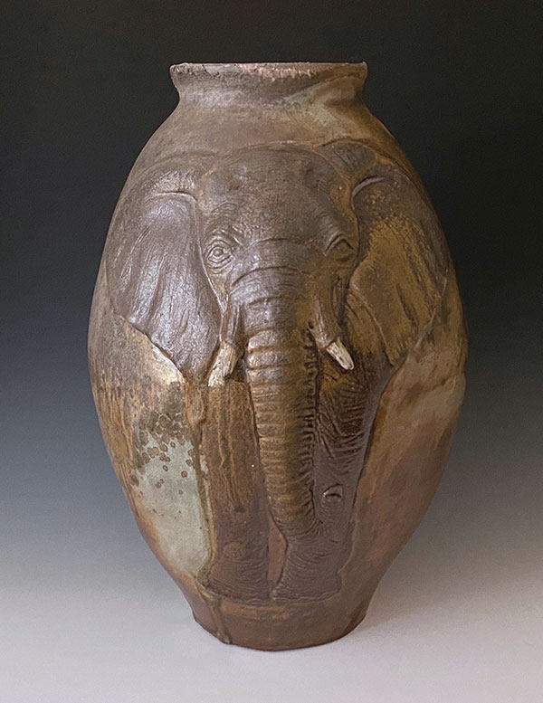 1 Eileen Sackman’s African Elephant Jar, 14 in. (36 cm) in height, wheel-thrown, hand-carved stoneware, porcelain slip, partial shino glaze, fired in Jack Troy’s Pixiegama kiln, spring 2020. 