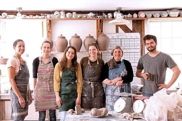 1 The Miranda Thomas Pottery Team (from left to right): Lucía Magee, Cassidy Metcalf, Grace Graham, Jackie Padich, Miranda Thomas, and Eric Moore. (Not pictured: master potters Evan Williams and Jessica King who have both worked with Thomas for 20 years).