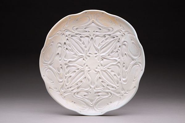 Ivory Medallion Plate, 10 3/4 in. (27 cm) in diameter, porcelain, soda fired to cone 7, 2018. Photos: Eddie Ing.