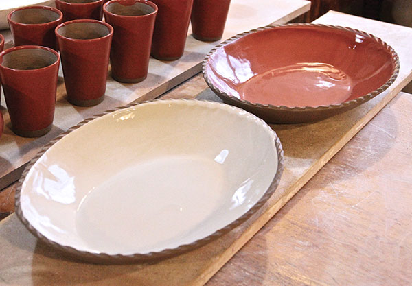 4 Set the dish aside until it reaches leather hard prior to carving, or decorate directly into the slip with combing or dragging with a blunt-ended tool.