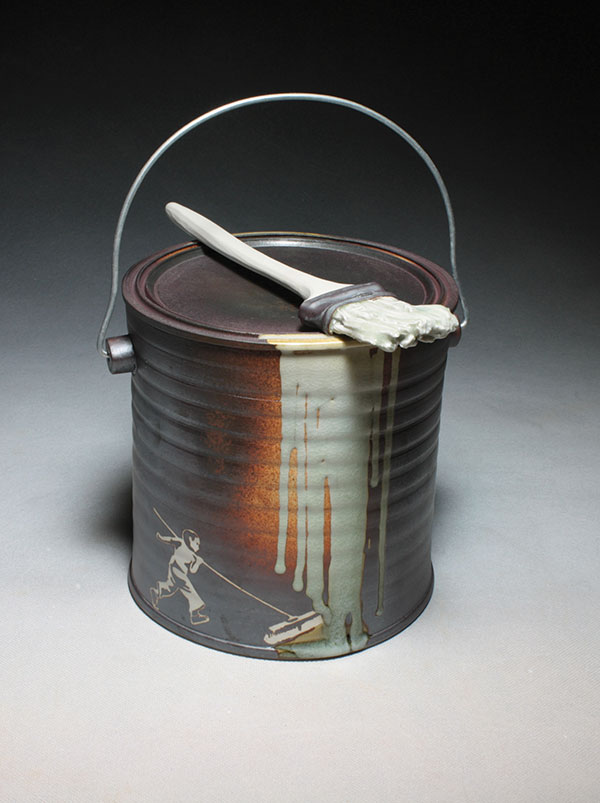 9 Michael Schwegmann’s Paint Can with Brush, 8 in. (20 cm) in height, porcelain, gas fired in reduction to cone 11, 2014.