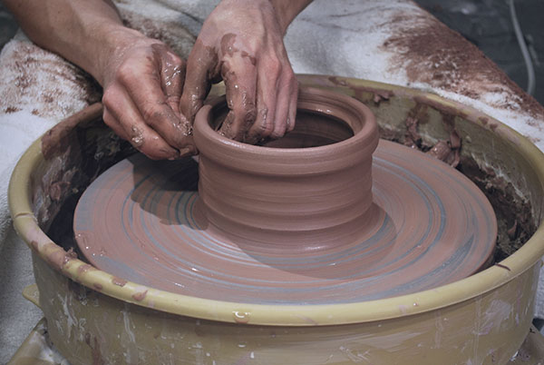 1 Starting with 2–3 pounds of clay, throw a wide cylinder and establish the lid seat.