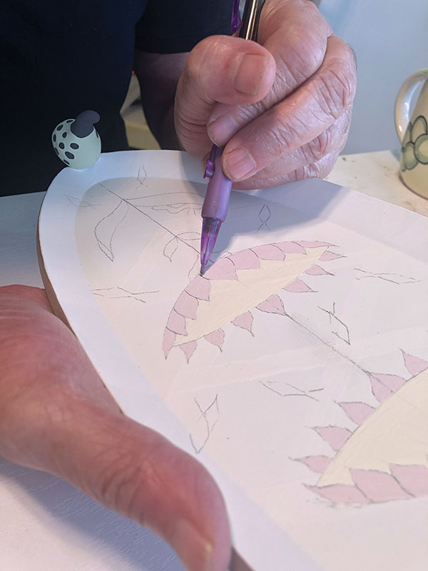 8 Outline the painted petals with pencil so you have a guide when painting lines.