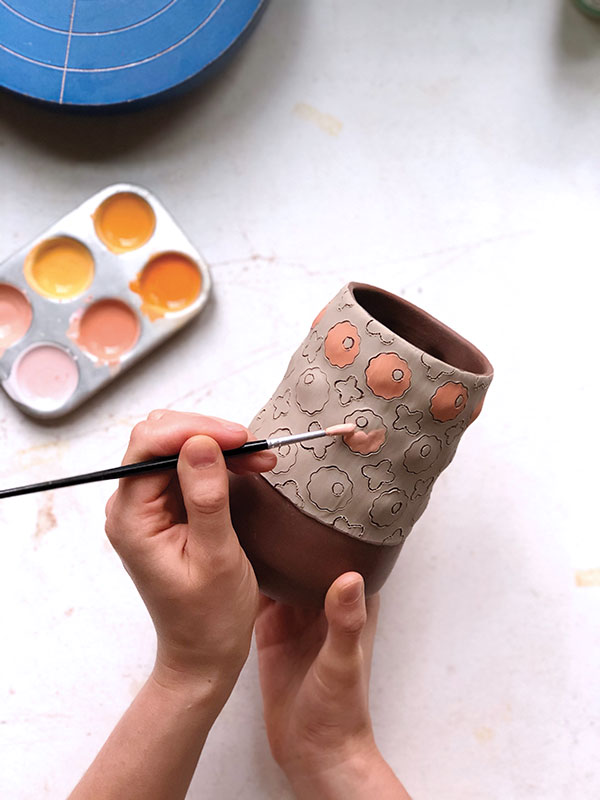 11 Apply two coats of underglaze to each shape, drying between each layer. 