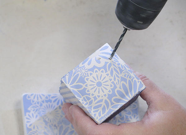 15 Drill holes into the top of the leather-hard shakers using a ⅛-inch drill bit.