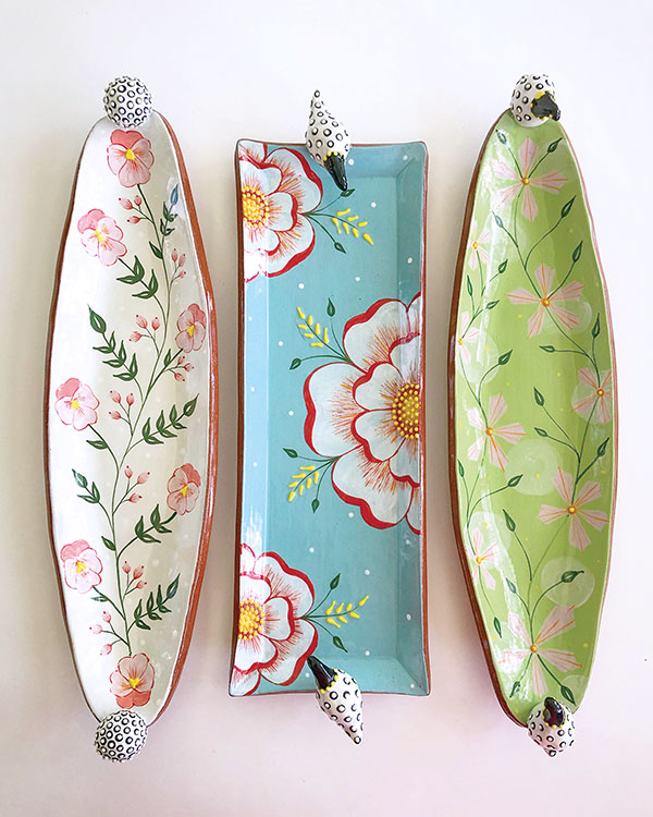 Donna Gardner Striar’s decorated platters.