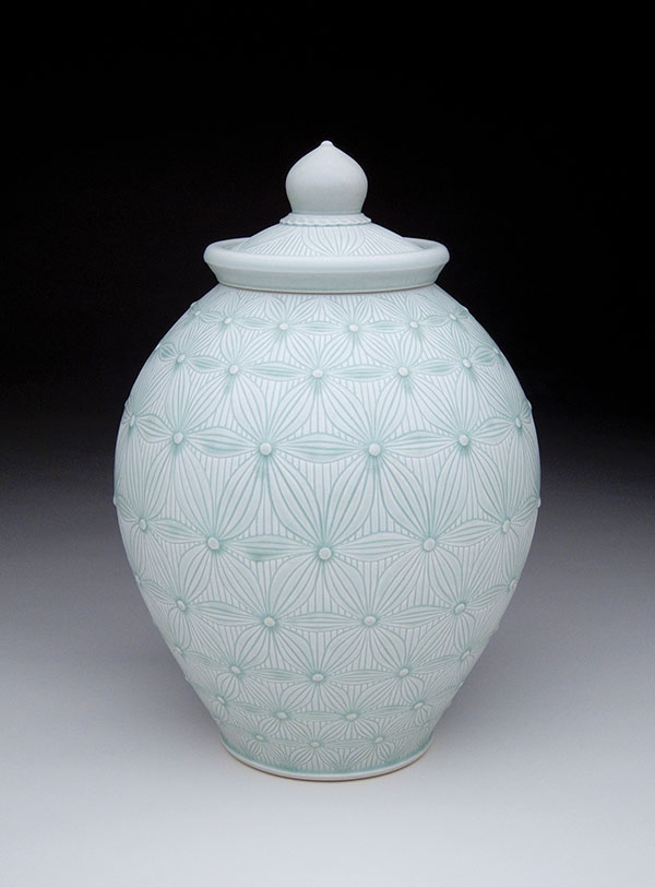 2 Adam Field’s covered jar, 14 in. (36 cm) in height, carved porcelain, celadon glaze.
