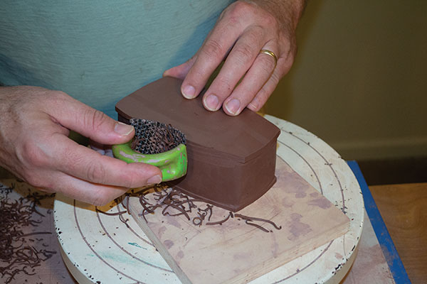 7 Trim any excess clay from the top and bottom slab with a rasp.