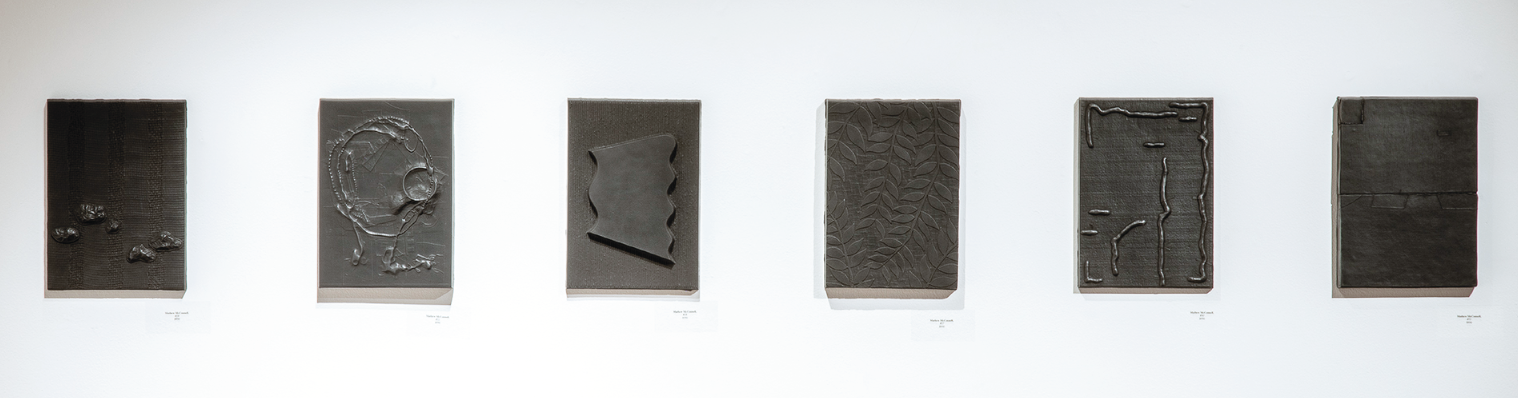 8 Mathew McConnell’s wall pieces, earthenware, bone charcoal, graphite.