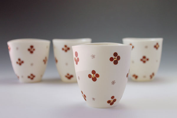 Wine cups, 3½ in. (9 cm) in diameter, slip-cast porcelain, assembled, iron sulfate, fired to 2232°F (1222°C).