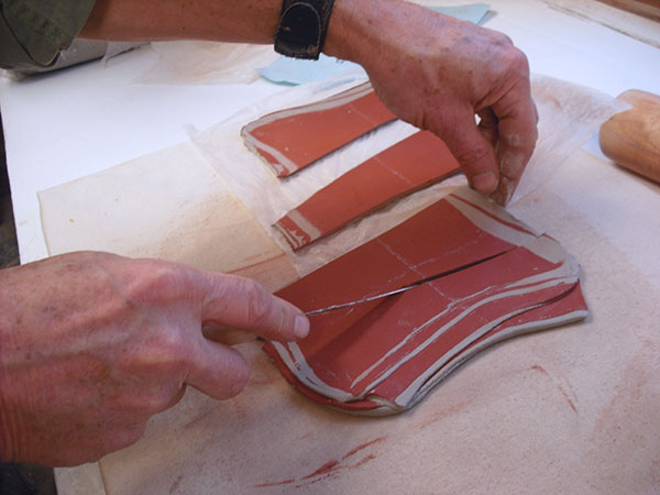 4 Cut the slab with a knife held at an angle to create a beveled cut.