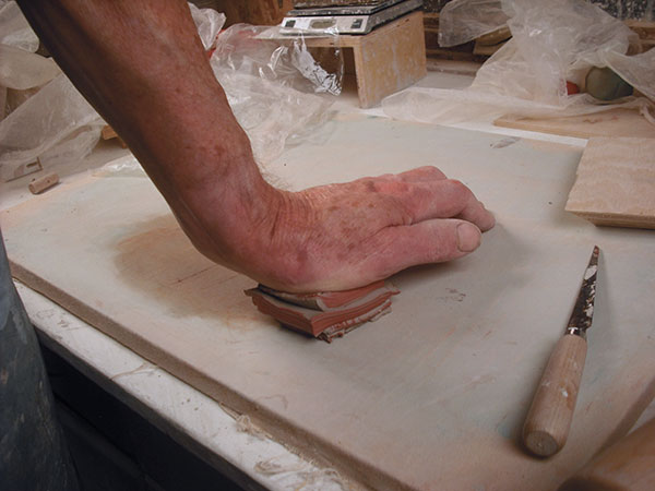 8 Compress the slab pieces together with a palm and roll out once again with a rolling pin. Repeat cutting and stacking to create more layers if desired. I have created slabs with up to 256 layers.