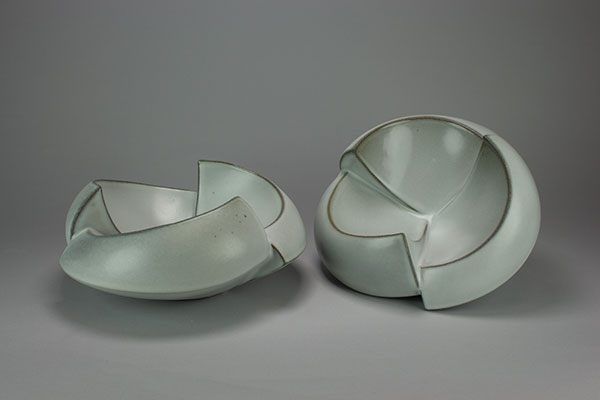 24 Three Point Bowls, to 10 in. (25 cm) in diameter, soda-fired stoneware, glaze.