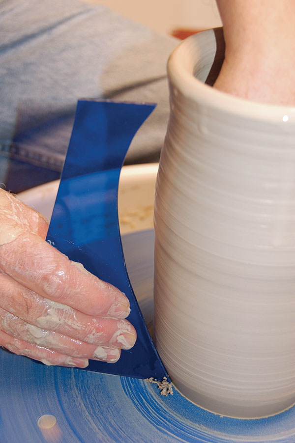 4 Larger forms also begin with throwing a basic cylinder form before shaping.