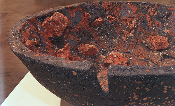 6 Fired black clay, slip, red iron oxide, copper wire. The plants and vermiculite have burned out. Photo: Michael Wolchover.