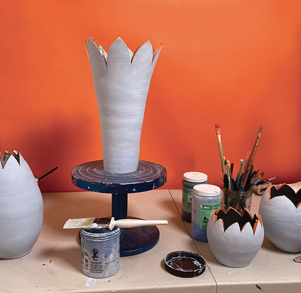 9 Apply two to three coats of a lighter colored underglaze as a base coat.