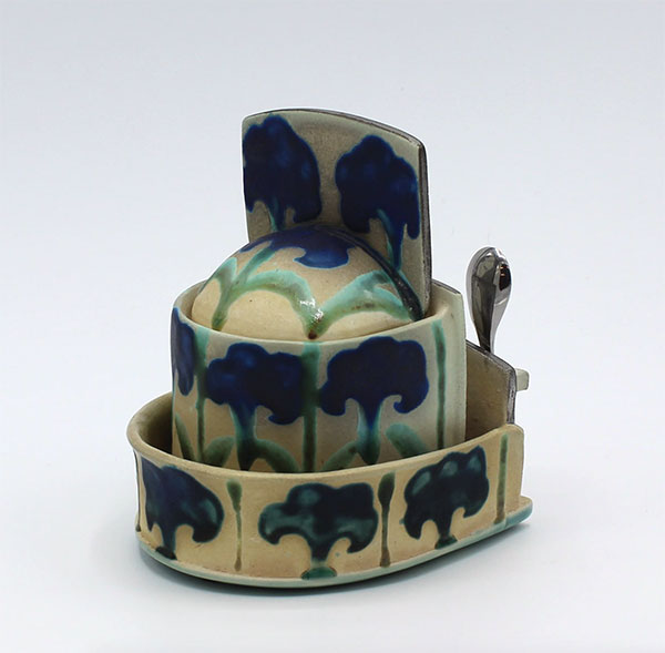 1 Julia Galloway’s sugar bowl in tray, 7 in. (18 cm) in height, soda-fired porcelain, luster, 2020. Photo: Jason Neal.