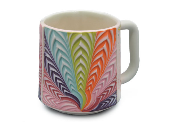 1 Kelly Justice’s Rainbow Peacock Mug, 3½ in. (9 cm) in height, slip-cast colored porcelain, fired to cone 6, 2020.